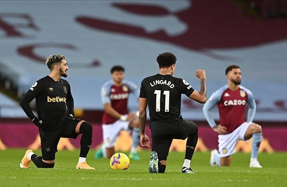 Jesse Lingard menjadi starter di laga pertamanya bersama West Ham ketika tandang ke markas Aston Villa, Kamis (4/2/2021) dini hari. (c) AP Photo