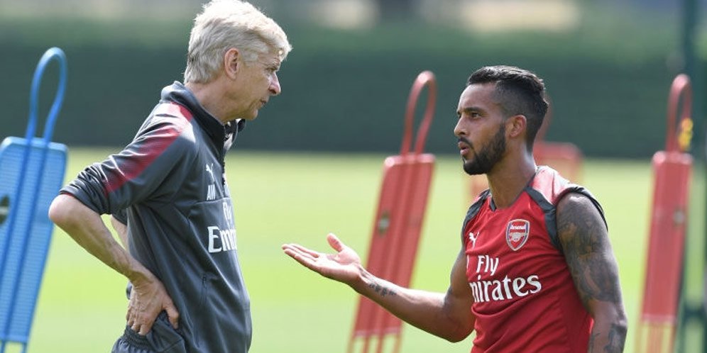 Arsene Wenger dan Theo Walcott
