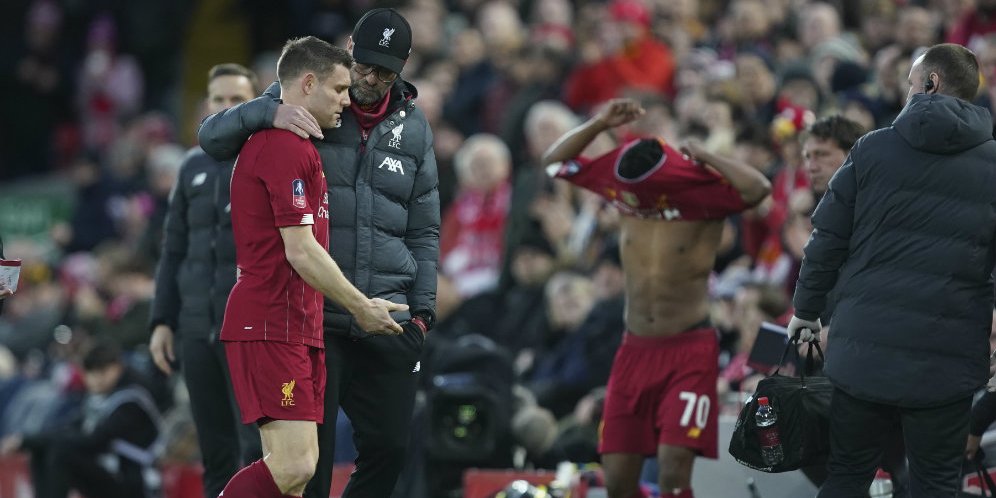 Jurgen Klopp dan James Milner. (c) AP Photo