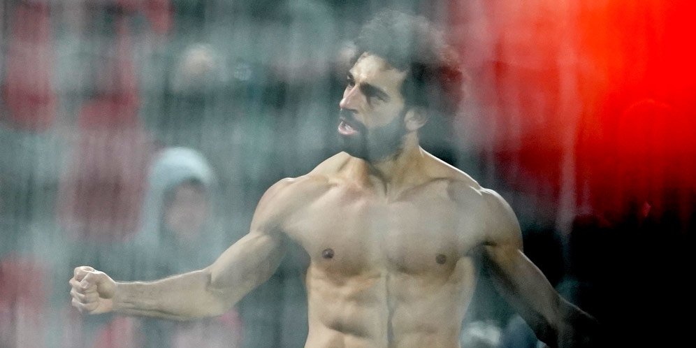 Selebrasi Mohamed Salah usai bobol gawang Manchester United. (c) AP Photo