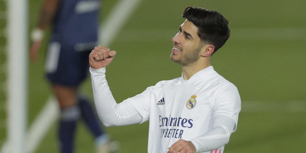 Marco Asensio usai mencetak gol ke gawang Celta Vigo pada pekan ke-17 La Liga musim 2020/2021 (c) AP Photo