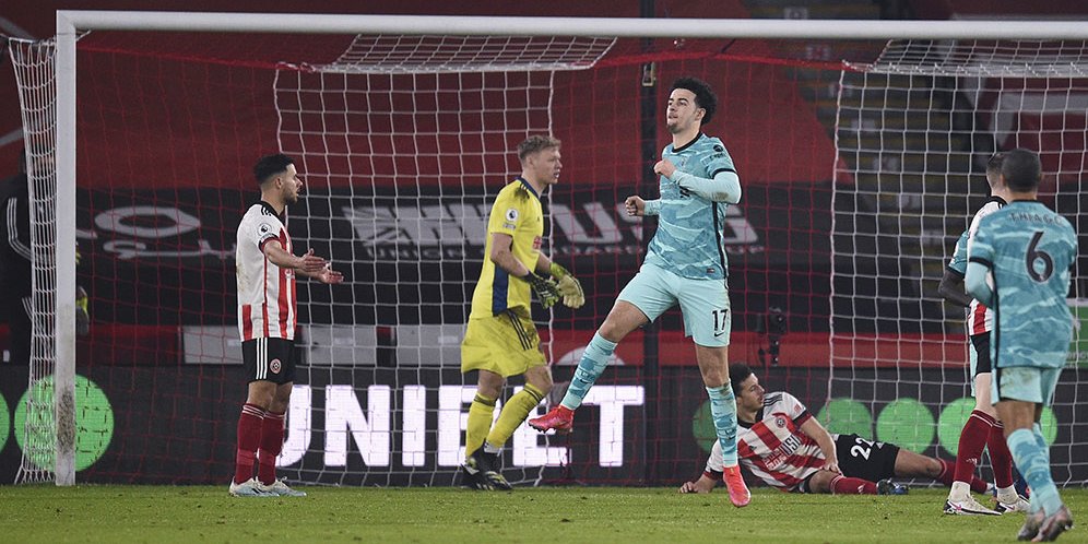 Pemain Liverpool, Curtis Jones, merayakan golnya ke gawang Sheffield United dalam laga lanjutan Premier League hari Senin (1/3/2021). (c) AP Photo